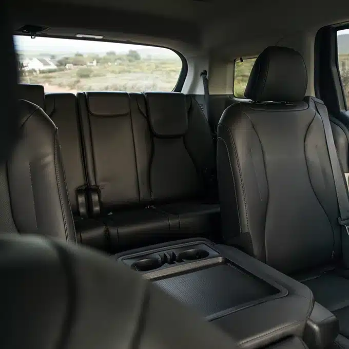 Individual rear passenger seating inside the Kia Carnival