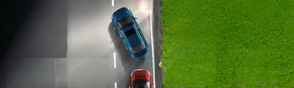 Official Picanto illustration of rear parking sensors detecting another vehicle