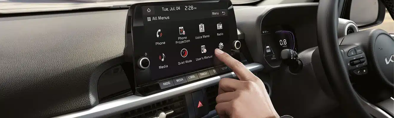 Kia Picanto touchscreen audio controls in use
