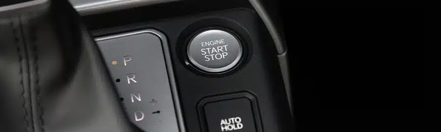 Kia Seltos engine start button and centre-console detail