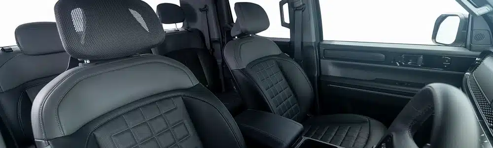 Front seats inside the Kia Tasman